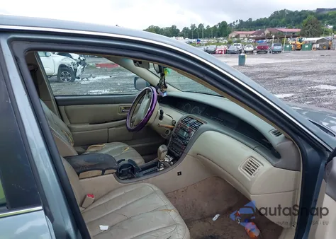 2001 Toyota Avalon Xl/Xls z USA, uszkodzony, nr VIN 4T1BF28BX1U54956